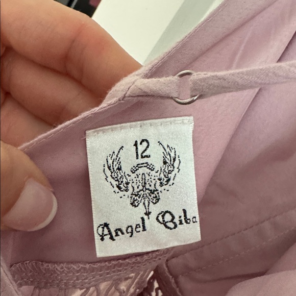 Walk This Way Pintuck Ruffle Detail Dress Blush
US 8 - Picture 6 of 9